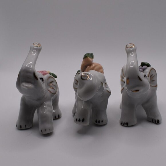 3 White Ceramic Elephants Carrying Flowers - Picture 4 of 8